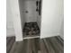 Laundry room with stone tile flooring and washer/dryer hookups at 5238 16Th St, Zephyrhills, FL 33542