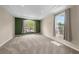 Spacious bedroom with large window and neutral carpeting at 212 Excalibur Ct, Brandon, FL 33511
