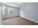 Bedroom with mirrored closet doors and neutral walls at 212 Excalibur Ct, Brandon, FL 33511