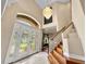 Two story entryway with hardwood floors and staircase at 212 Excalibur Ct, Brandon, FL 33511