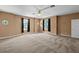 Spacious bedroom with two windows and carpet at 212 Excalibur Ct, Brandon, FL 33511