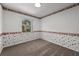 Bright bedroom with carpeting, window, and patterned wallpaper at 212 Excalibur Ct, Brandon, FL 33511