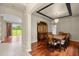 Spacious dining room with hardwood floors and view to the living room at 212 Excalibur Ct, Brandon, FL 33511