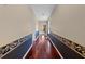 Hardwood floor hallway with decorative wall at 212 Excalibur Ct, Brandon, FL 33511