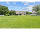 Two-story house with a large backyard at 212 Excalibur Ct, Brandon, FL 33511