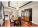 Formal dining room featuring hardwood floors and a charming built-in hutch at 212 Excalibur Ct, Brandon, FL 33511