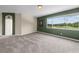 Bright living room with large windows and view of backyard at 212 Excalibur Ct, Brandon, FL 33511