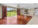 Bright living room with hardwood floors, access to backyard, and lots of natural light at 212 Excalibur Ct, Brandon, FL 33511