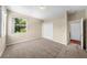 Bedroom with double door closet and window at 212 Excalibur Ct, Brandon, FL 33511