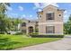 Two-story house with a large yard and driveway at 212 Excalibur Ct, Brandon, FL 33511