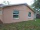 Rear view of the house showing two windows at 7101 Green St, New Port Richey, FL 34652