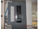 Open electrical panel with circuit breakers at 7101 Green St, New Port Richey, FL 34652