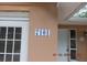 Image of the house number 7101 on a tiled plaque at 7101 Green St, New Port Richey, FL 34652