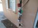 Exterior view of pipes and fire safety equipment at 7101 Green St, New Port Richey, FL 34652