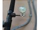 Close-up of a pressure gauge on a pipe at 7101 Green St, New Port Richey, FL 34652