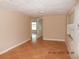 Living room with tile floors and access to other rooms at 7101 Green St, New Port Richey, FL 34652