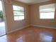 Living Room with tile floors and access to patio at 7101 Green St, New Port Richey, FL 34652