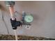 Pressure gauge affixed to a pipe at 7101 Green St, New Port Richey, FL 34652