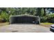 Metal carport providing covered parking at 4375 Lindsey Loop, Dover, FL 33527