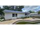 House exterior with damaged pool in the backyard at 4375 Lindsey Loop, Dover, FL 33527