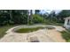 Kidney-shaped pool needing attention at 4375 Lindsey Loop, Dover, FL 33527
