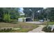 Backyard with storage shed and a car parked at 4375 Lindsey Loop, Dover, FL 33527