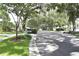Charming neighborhood street lined with mature trees, well-maintained lawns, and inviting homes at 5308 Cedarshake Ln, Valrico, FL 33596