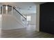 Bright and airy living room with hardwood floors and a view to the kitchen at 5308 Cedarshake Ln, Valrico, FL 33596