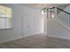 Bright living room with hardwood floors and double doors at 5308 Cedarshake Ln, Valrico, FL 33596