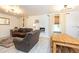 Spacious living room featuring a leather couch and a wood-burning stove at 4622 Paloverde Dr, New Port Richey, FL 34652
