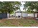 Backyard with shed, grill, and patio at 4622 Paloverde Dr, New Port Richey, FL 34652