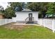 Charming house exterior with a fenced yard at 4622 Paloverde Dr, New Port Richey, FL 34652