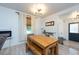 Bright dining area with farmhouse table and bench seating near the entryway at 4622 Paloverde Dr, New Port Richey, FL 34652