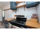 Updated kitchen with wood countertops and gas cooktop at 4622 Paloverde Dr, New Port Richey, FL 34652