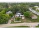 House and yard aerial view showing a neighborhood setting at 4622 Paloverde Dr, New Port Richey, FL 34652