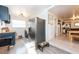 Modern kitchen with dark blue cabinetry and stainless steel appliances at 4622 Paloverde Dr, New Port Richey, FL 34652