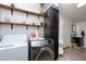 Laundry room with washer, dryer, and built-in storage at 4622 Paloverde Dr, New Port Richey, FL 34652