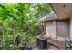Small patio area with fire pit and potted plants at 807 Hunters Ct, Brandon, FL 33511