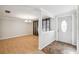 Dining room with chandelier, hardwood floors, and entryway with decorative tile at 5527 Riddle Rd, Holiday, FL 34690