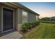 Front door view with landscaping and walkway at 7828 Stonebrook Cir, Wesley Chapel, FL 33545