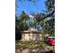 Tan house exterior with a wooden door and steps at 405 E Dr Martin Luther King Jr Blvd, Tampa, FL 33603