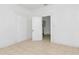 Simple bedroom with tile floors and access to other rooms at 405 E Dr Martin Luther King Jr Blvd, Tampa, FL 33603