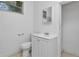 Clean bathroom with white vanity and tile floors at 405 E Dr Martin Luther King Jr Blvd, Tampa, FL 33603