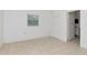 Bright bedroom with tile floors and access to bathroom at 405 E Dr Martin Luther King Jr Blvd, Tampa, FL 33603