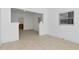 Bright living room with tile floors and views into kitchen area at 405 E Dr Martin Luther King Jr Blvd, Tampa, FL 33603