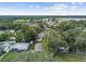 Wide aerial view of the house and surrounding neighborhood at 7024 Filbert Ln, Tampa, FL 33637