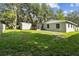 Large backyard with shed and screened porch at 7024 Filbert Ln, Tampa, FL 33637