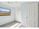Bedroom with window, closet and white door at 7024 Filbert Ln, Tampa, FL 33637