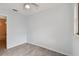 Bedroom with bathroom access and grey floor tile at 7024 Filbert Ln, Tampa, FL 33637