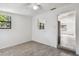 Spacious bedroom with view into another room at 7024 Filbert Ln, Tampa, FL 33637
